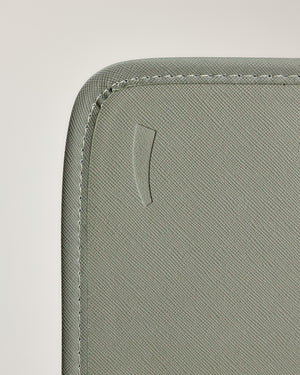 Close-up of the Care.ē.on Carry-All exterior fabric and stitching.