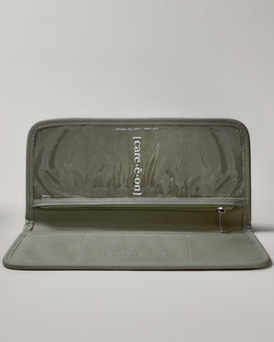 Care.ē.on Carry-All travel organizer folded open showing zipper pockets.