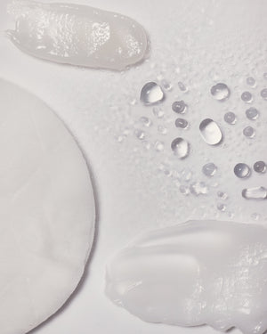 Close-up of hydrating skincare textures and water droplets.