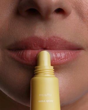 Close-up of Care.ē.on Layover Lip Mask being applied to lips.