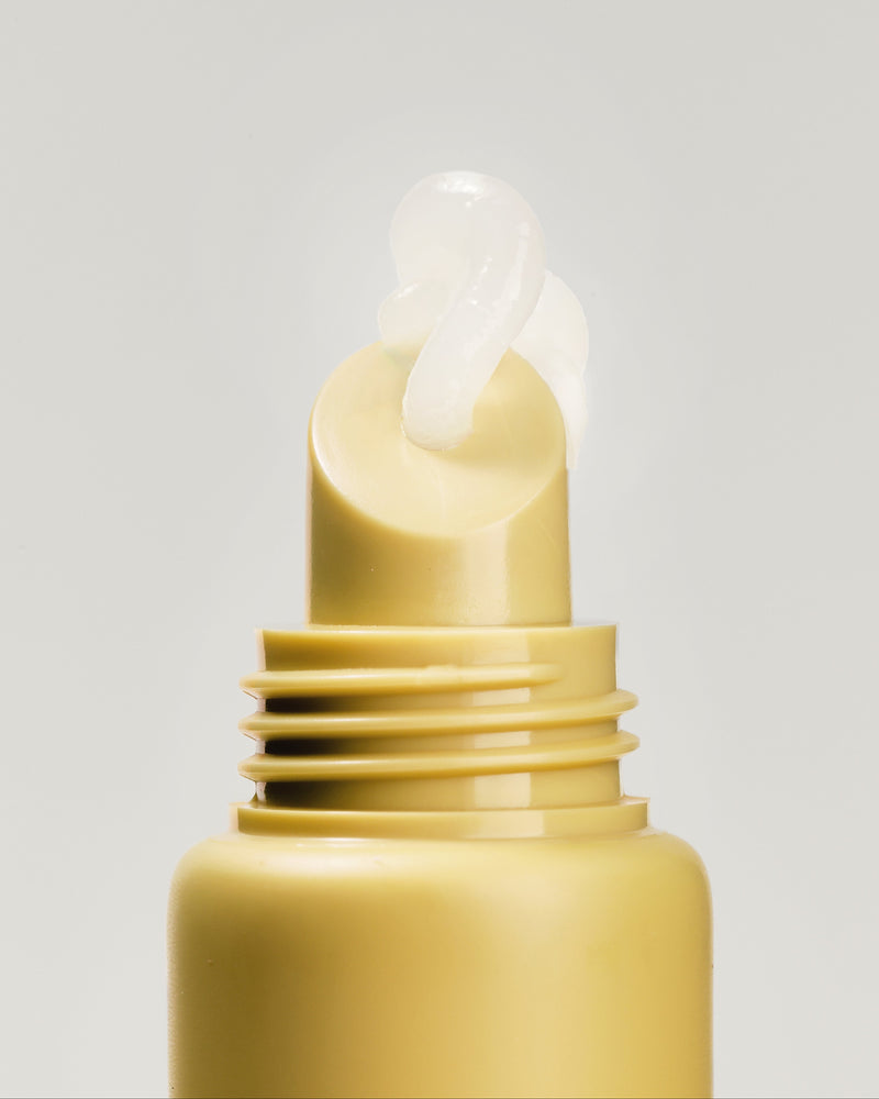 Close-up of the Care.ē.on Layover Lip Mask applicator with lip mask dispensed from the tube.
