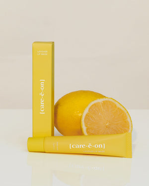 Care.ē.on Layover Lip Mask displayed with fresh citrus.
