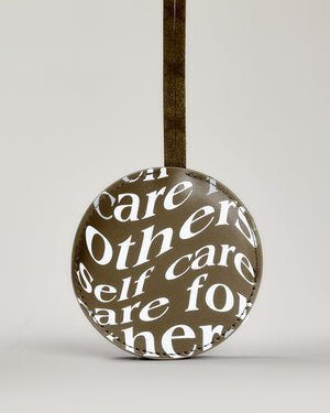 Care.ē.on Vegan Voyage Luggage Tag with Care for Others, Self Care graphic.