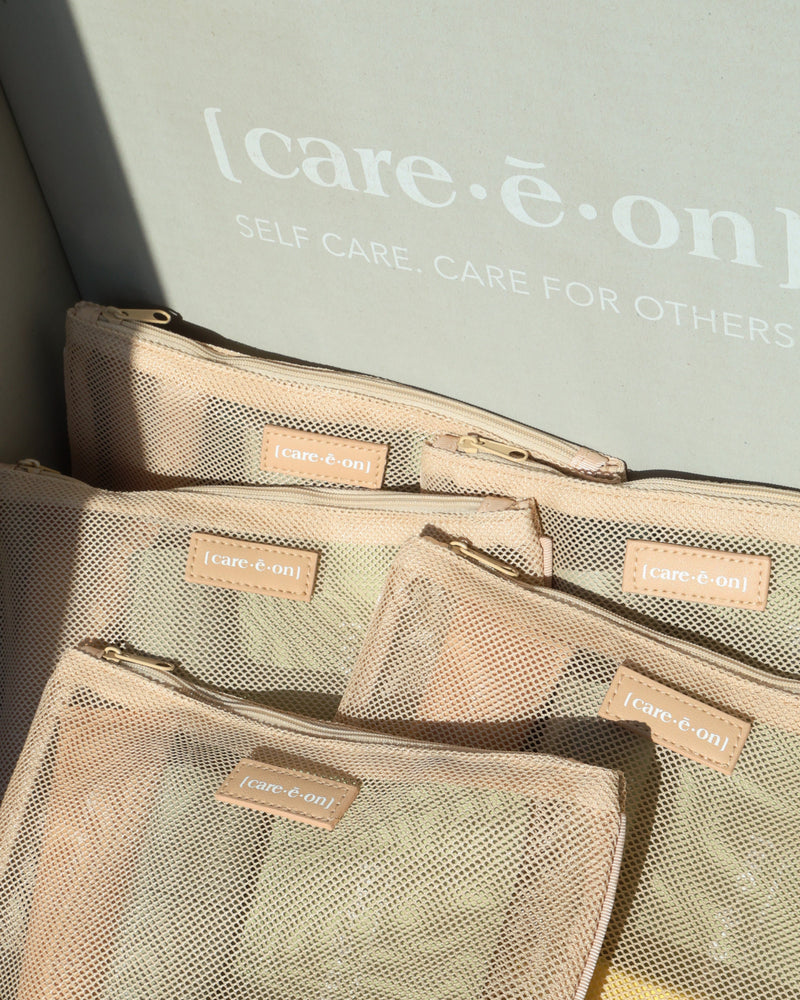 Care.ē.on VIP Party Pack mesh pouches arranged inside a branded box.